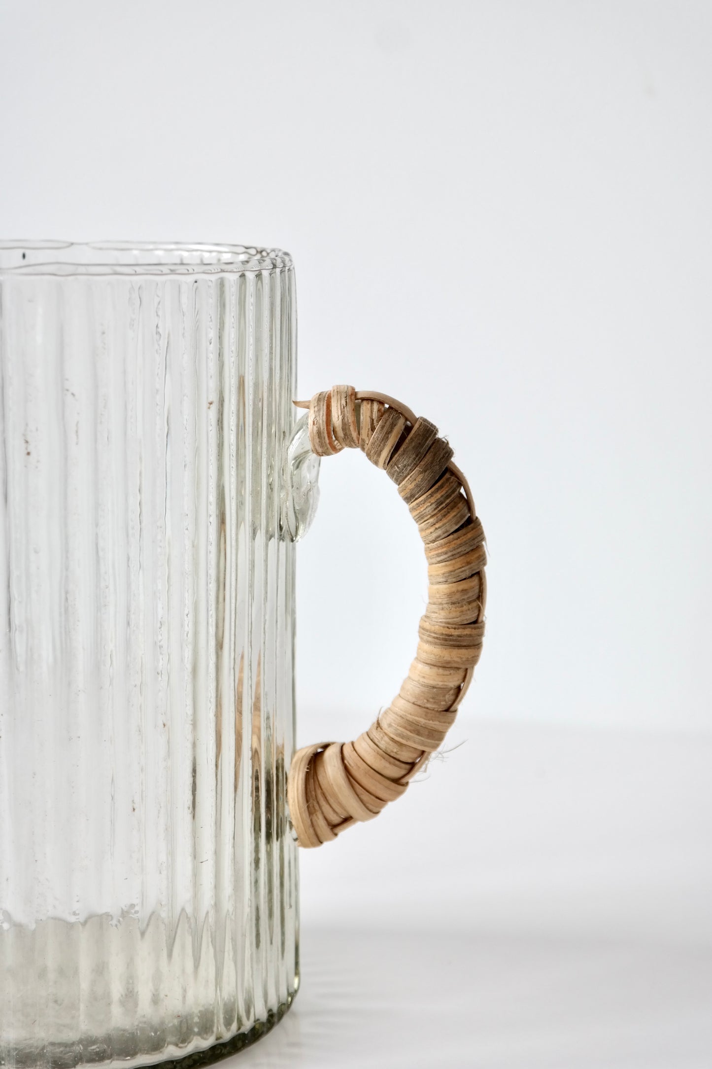 Rattan Handle Glass Pitcher